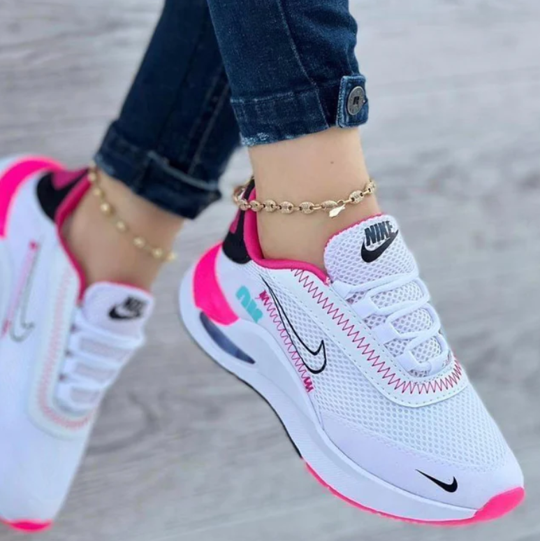 Nike Blanco Borde Fucsia.