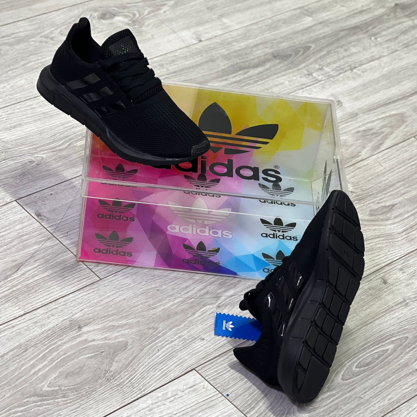 Adidas Tres Líneas.